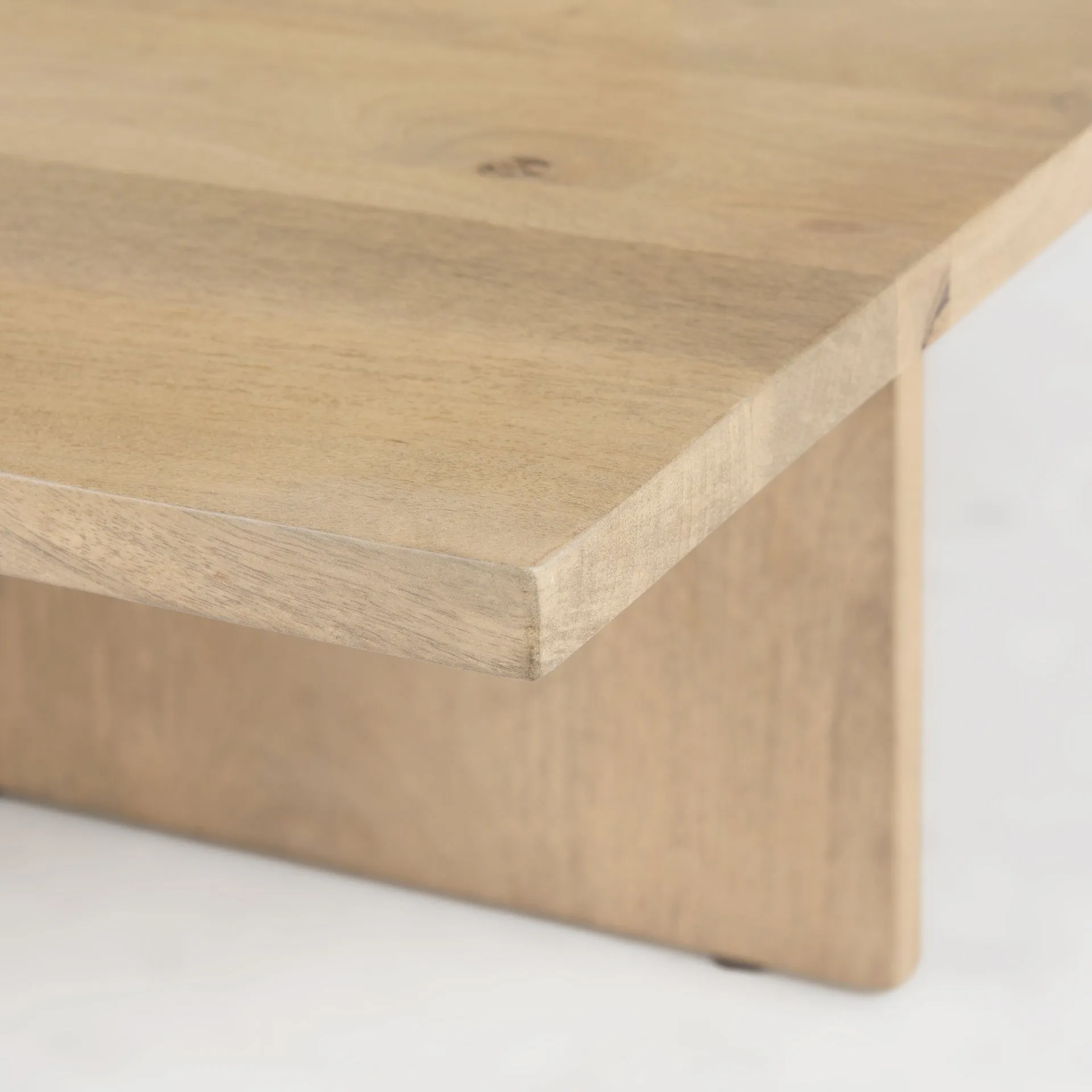 Aida Coffee Table – Contemporary Mango Wood Design with Unique Protruding Legs for Modern Spaces