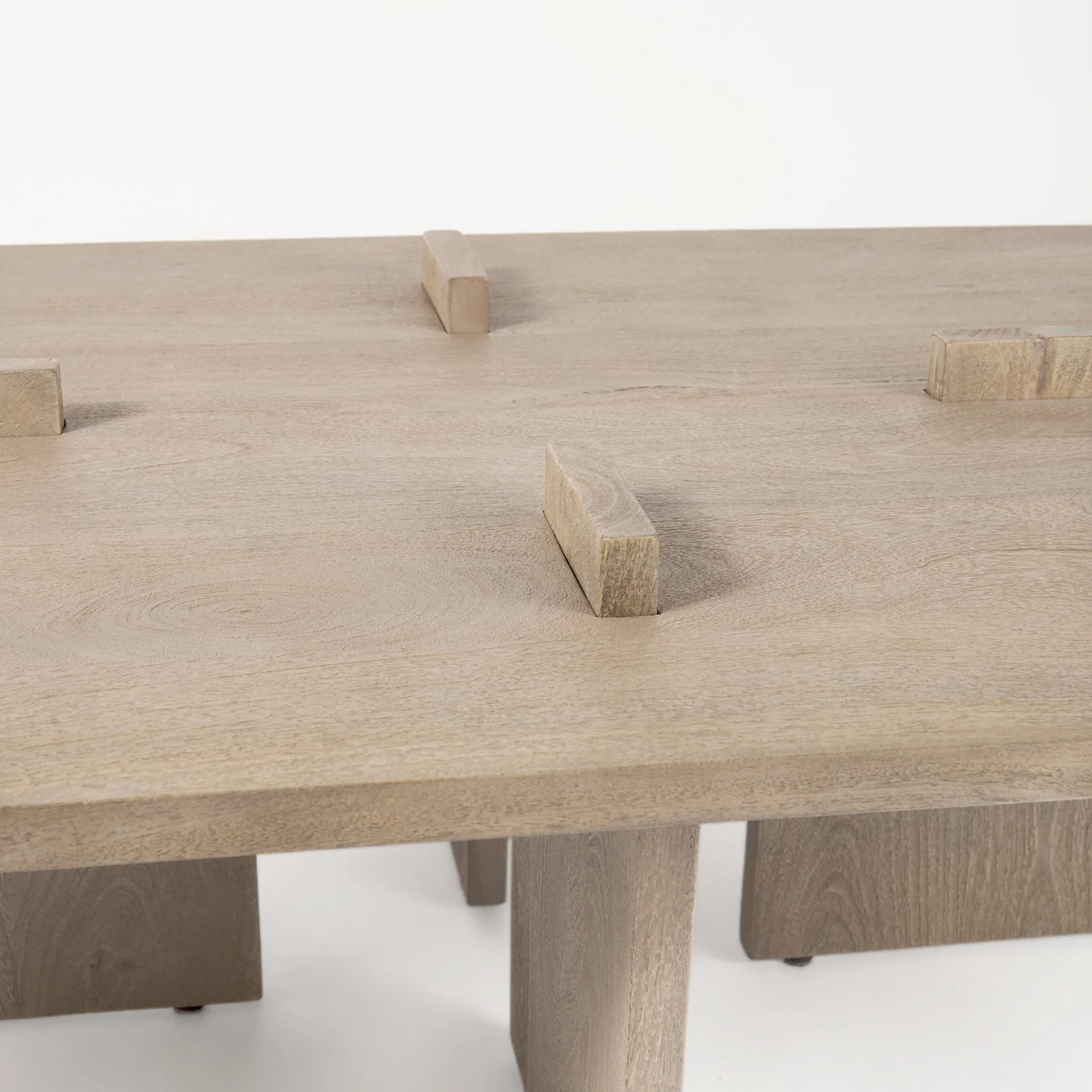 Aida Coffee Table – Contemporary Mango Wood Design with Unique Protruding Legs for Modern Spaces